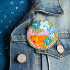 Fox Brooch worn on denim jacket.