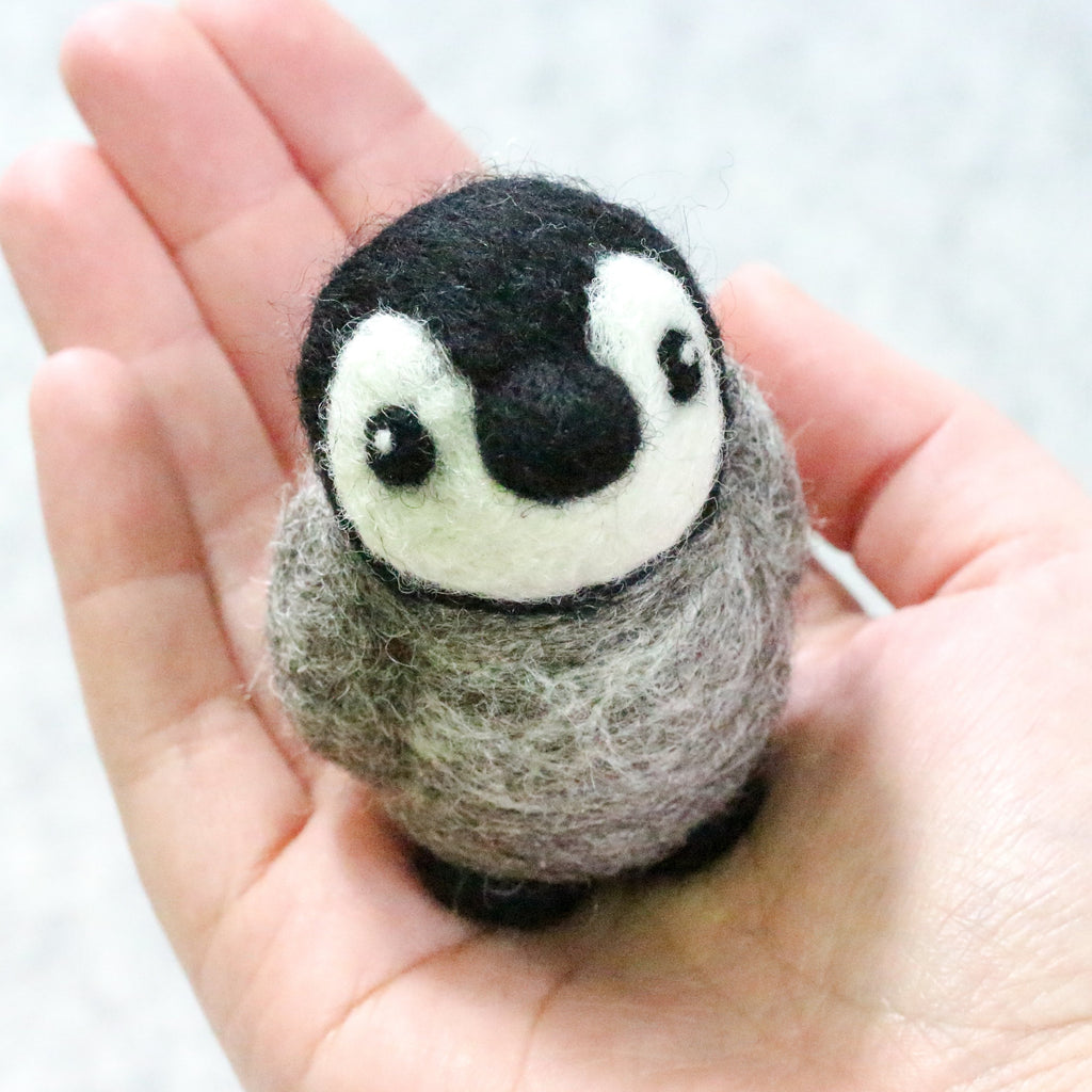 completed Baby Penguin Felting Kit in hand