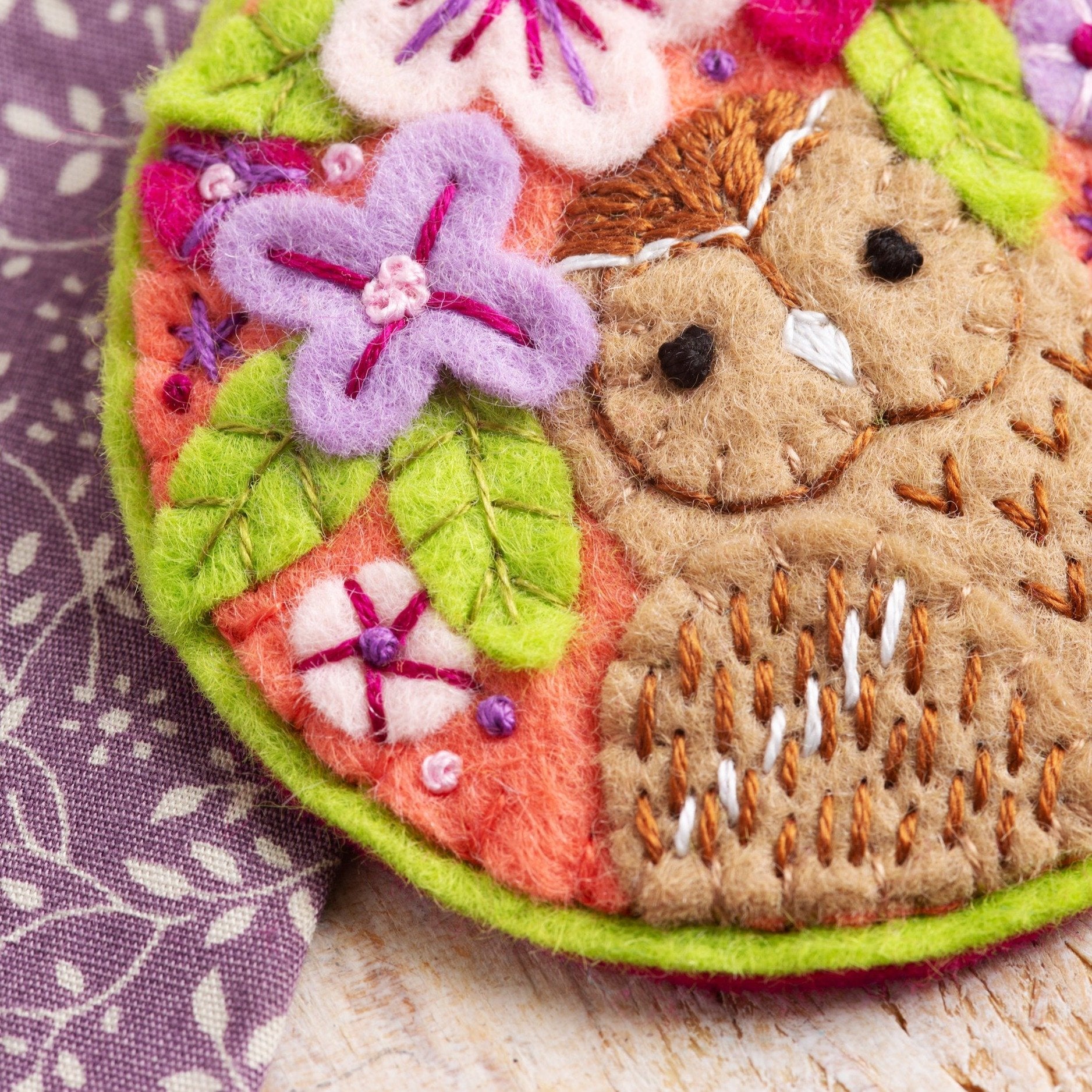 Close up image of tawny owl brooch 