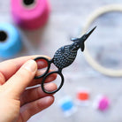 Black Sheep Embroidery Scissors closed in hand