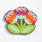 Clipped image of Marianne flower brooch felt craft kit on white background.